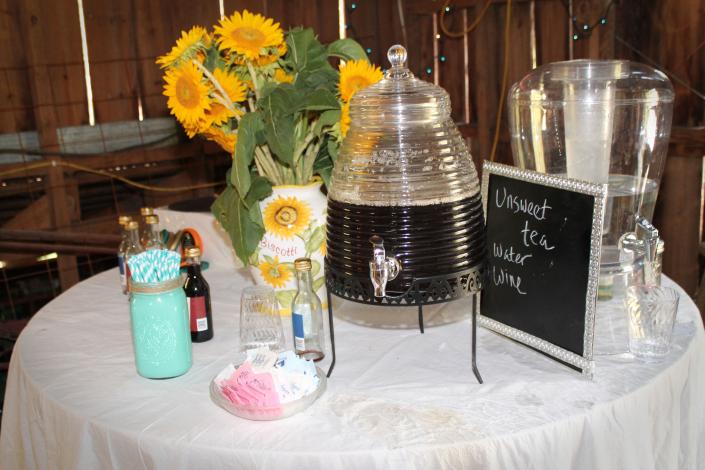 Guests may serve themselves at this table decorated in the bride's colors and according to her theme.