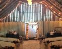 Darling antique pews moved permanently from a local chapel, adorned with Hydrangeas and burlap pew bows, setting off a Fall Wedding to perfection in the Hidden Valley Barn Loft.  Imagine every eye on you as you walk this aisle!