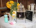 Guests may serve themselves at this table decorated in the bride's colors and according to her theme.